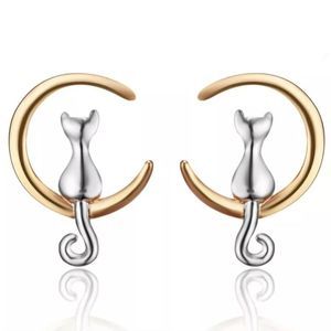 SILVER CAT KITTY SITTING IN THE GOLD MOON TINY POST EARRINGS.